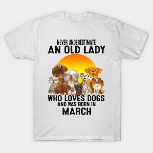 Never Underestimate An Old March Lady Who Loves Dogs T-Shirt